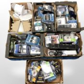 A pallet of ex-retail electricals including optical cables, portable speakers,