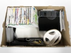 A Nintendo Wii, Wii Fit board, quantity of games and accessories.