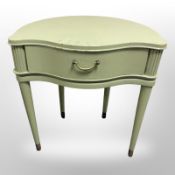 An early-20th century continental serpentine-front bedside stand, width 50cm.