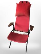 A Scandinavian teak and metal framed folding chair