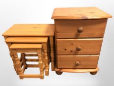 A contemporary pine bedside chest,