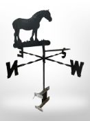 A wrought-iron weather vane depicting a shire horse, height 77cm.