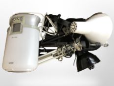 A vintage angle-poise lamp, further contemporary lamp, and a Philips wake-up light.