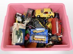 A quantity of boxed and unboxed die-cast vehicles including Days Gone, Burago, etc.