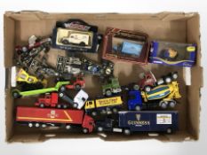A group of boxed and unboxed die-cast vehicles including Corgi, Matchbox, John Player Formula 1 car,