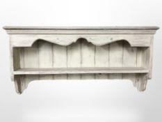 A pine scumbled finished wall shelf,