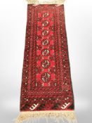 A Turkoman runner, Afghanistan, 151cm x 50cm.