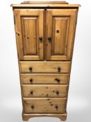 A contemporary pine cabinet,