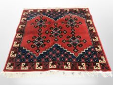 A woollen rug of Iranian Afshar design, 166cm x 152cm.