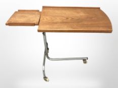 A 20th century Danish chrome and teak reading table