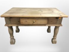 A 19th-century pine kitchen table fitted a drawer, 127cm long x 77cm wide x 77cm high.