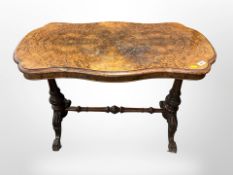 A Victorian figured walnut shaped top occasional table,