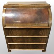 A 19th-century continental mahogany cylinder-front bureau, 95cm wide x 61cm deep x 113cm high.
