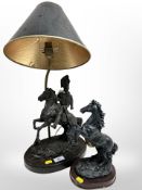 A contemporary resin table lamp depicting a Hussar on horseback and a further resin sculpture of a