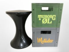 Two plastic bottle crates, and a late-20th century Scandinavian plastic hourglass-shaped stool.