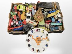 A collection of vintage and modern die-cast cars and other vehicles and toys.