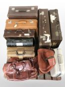 A group of vintage luggage cases and hold-alls.
