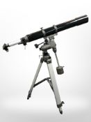 A Celestron model 21077 C80-HD telescope on tripod