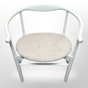 A Scandinavian painted framed armchair