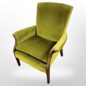 A 20th century beech framed armchair in green dralon