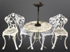 A painted cast aluminium garden table and four chairs,