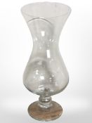 A large glass goblet-shaped vase, height 55cm.