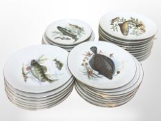 Approximately 46 German porcelain dishes depicting fish.