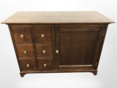 A contemporary entertainment sideboard fitted cupboards and drawers,