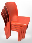 Four 20th century plastic stacking chairs