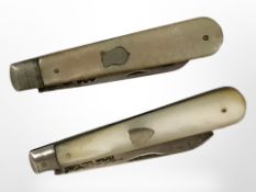 Two mother of pearl and silver fruit knives.