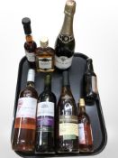 Eight various bottles of alcohol including VSOP Napoleon brandy, Traditional Damson gin liqueur,