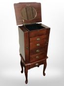 A reproduction jewellery cabinet,