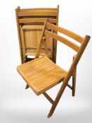A set of four folding garden chairs CONDITION REPORT: One chair missing seat