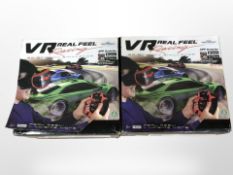 Two VR 3D racing simulators, both boxed.