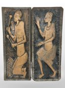 A pair of African embossed copper relief panels, length 62cm.