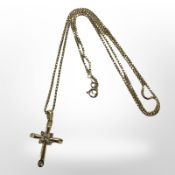 An 18ct yellow gold necklace with diamond-set crucifix pendant, chain length 64cm,
