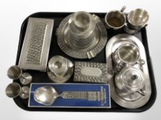 A collection of pewter wares including squat candlesticks, matchbox holder, dishes, etc.