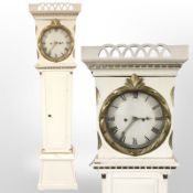 A 19th-century Scandinavian painted and gilt pine longcase clock with pendulum and weights,