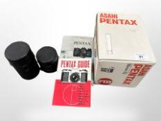 A Pentax SP1000 in original box, Pentax guide book and reference guide,