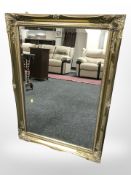 A Victorian style gilt framed overmantel mirror,