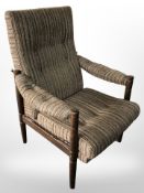 A 20th century Danish stained beech framed armchair