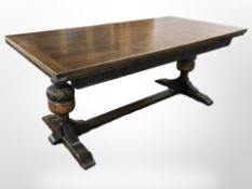 A good quality reproduction carved oak extending rectory dining table total length 273 cm and six