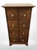 A contemporary eight drawer chest,