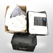 A Dorma king size quilt, a further hotel suite, 200cm x 200cm quilt, both in bags,
