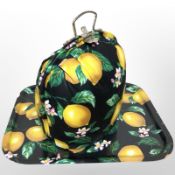 A Paule Marrot lemon-patterned drinks tray and similar bag.