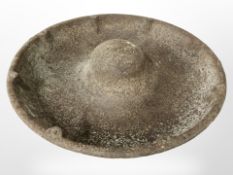 A cast-iron pig feeding trough, diameter 74cm.