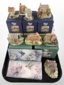 A group of boxed Lilliput Lane cottages and three Bradford exchange limited edition porcelain