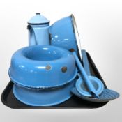 A group of early-20th century Danish blue enamelled kitchen wares.
