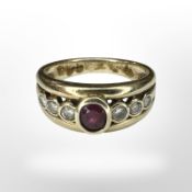 A 9ct yellow gold ring set with synthetic stones, size M. CONDITION REPORT: 4.3g.