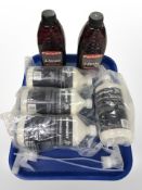 Four bottles of M-Sport waterless car wash and wax, and two bottles of motorcycle oil.